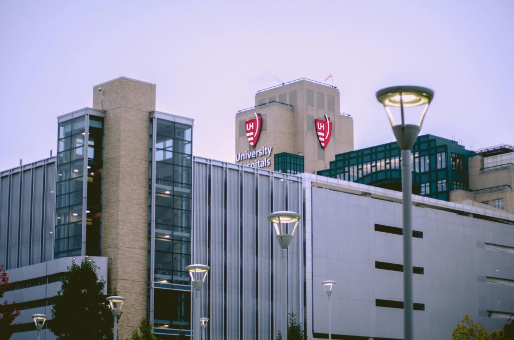 View of University Hospitals building in Cleveland, OH against a clear sky.